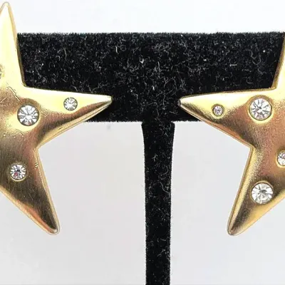 Sale Photo Thumbnail #39: Vintage Gold Tone and Rhinestone Star Clip On Earrings Marked KJL