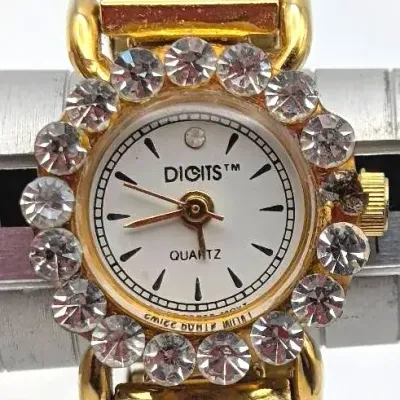 Sale Photo Thumbnail #43: Digits Stretch Gold Tone Ring Watch
