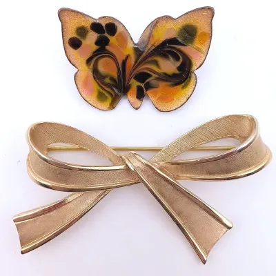 Sale Photo Thumbnail #59: Trifari Gold Tone Bow Pin | Enamel Butterfly Pin