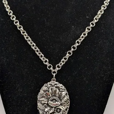 Sale Photo Thumbnail #28: Silver Tone Floral Locket with Long Chain