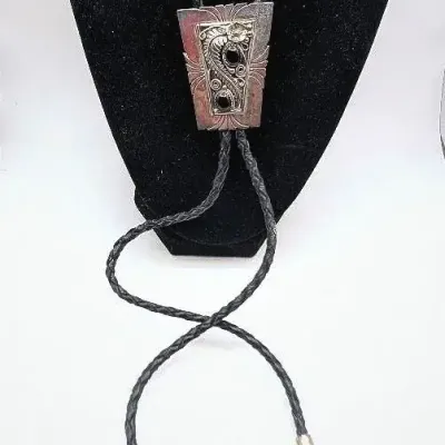 Sale Photo Thumbnail #72: Sterling Silver and Onyx Bolo Tie
