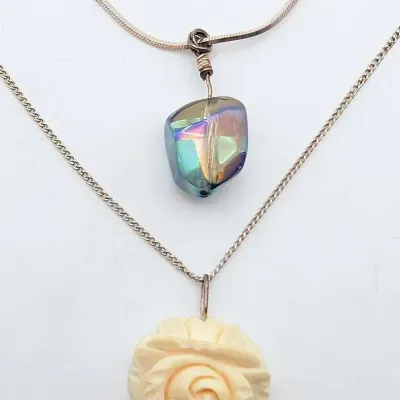 Sale Photo Thumbnail #110: Two Necklaces | Carved Flower Pendant | Iridescent Glass Pendant  