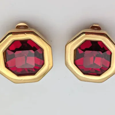 Sale Photo Thumbnail #2: Vintage Swarovski Red Crystal and Gold Tone Clip On Earrings Marked S. A. L. 