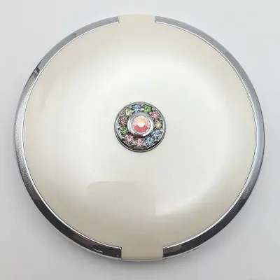 Sale Photo Thumbnail #25: Vintage Off White Mirror Compact with Rhinestone Details