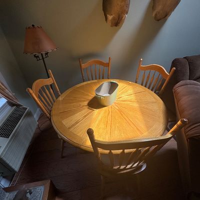 Sale Photo Thumbnail #34: Oak table and 4 chairs w/ leaf. 48” without leaf