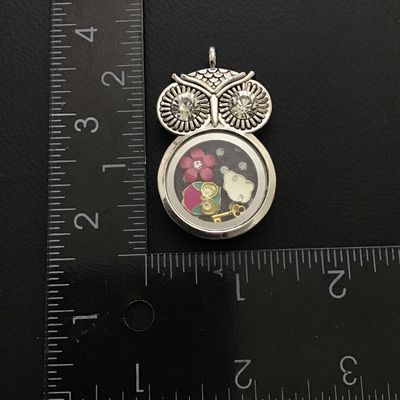 Silver tone owl pendant with charms