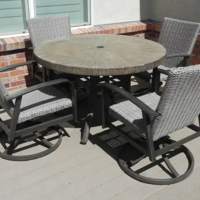 Outdoor Round Top Table with Four Swivel Chairs
