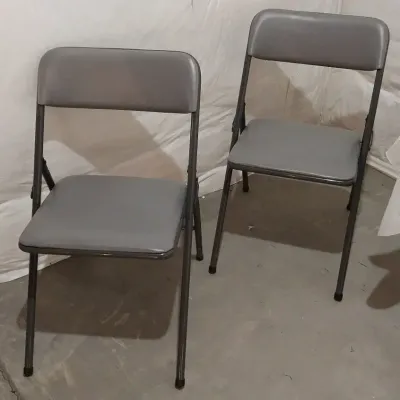 Two Metal Folding Chairs