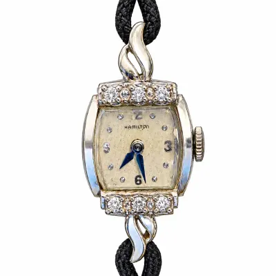 Sale Photo Thumbnail #36: LADIES 14k & DIAMOND HAMILTON COCKTAIL WATCH
