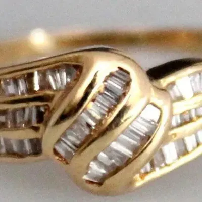 Sale Photo Thumbnail #26: ESTATE 14k GOLD AND CHANNEL SET BAGUETTE DIAMOND RING