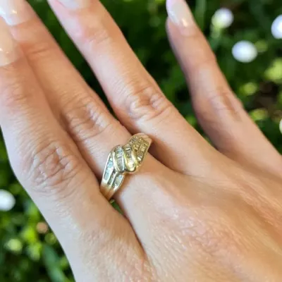Sale Photo Thumbnail #27: ESTATE 14k GOLD AND CHANNEL SET BAGUETTE DIAMOND RING