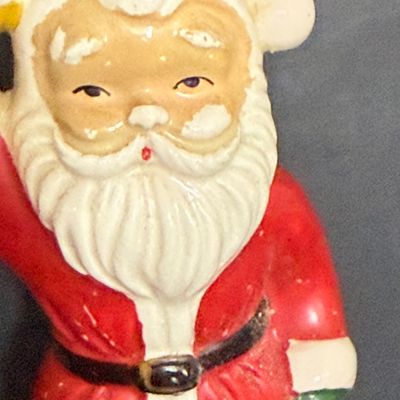 LOT 57: Vintage Holiday Christmas Decor Featuring a Styrofoam Santa Head, Ceramic Santa and a Plastic Jack in the Box Ornament