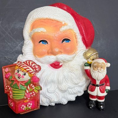 LOT 57: Vintage Holiday Christmas Decor Featuring a Styrofoam Santa Head, Ceramic Santa and a Plastic Jack in the Box Ornament