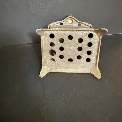 LOT 81: Vintage/Antique Queen Cast Iron Stove with Pot and Pans and Star Toy Stove