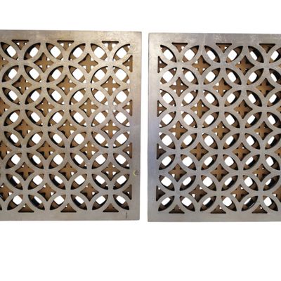 PAIR OF MIRRORED FRETWORK PANEL WALL DECORATIONS