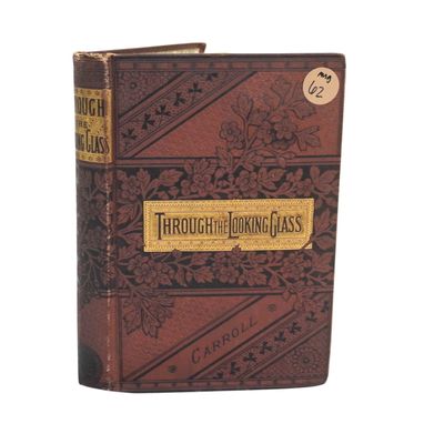 ANTIQUE EDITION OF THROUGH THE LOOKING GLASS BY LEWIS CARROLL