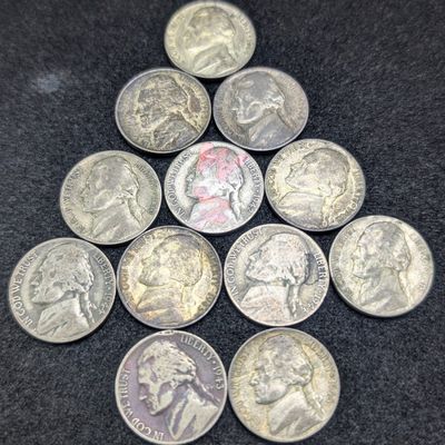 Sale Photo Thumbnail #195: (12) 1942-1945 35% Silver Jefferson War Nickels - Mixed Mint Marks