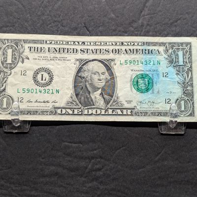 Sale Photo Thumbnail #212: 2013 Series U.S. $1 Federal Reserve Note issued in California - Ink Smear Error