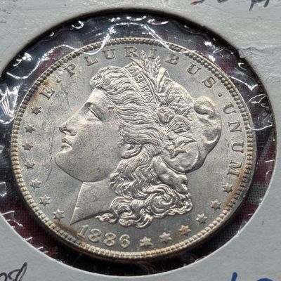 Sale Photo Thumbnail #173: 1886-P Morgan 90% Silver Dollar
