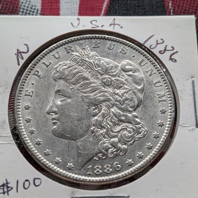 Sale Photo Thumbnail #206: 1886 Morgan 90% Silver Dollar