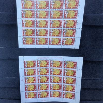 Sale Photo Thumbnail #341: (2) Sheets of 1994 Year of the Dog 29 Cent Stamps, $11.60 Face Value