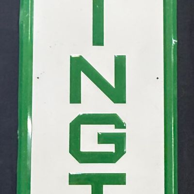 Sale Photo Thumbnail #185: Remington Tires Embossed Metal Vertical Advertising Sign
