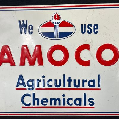 Sale Photo Thumbnail #69: We Use AMOCO Agricultural Chemical Embossed SST Tin Sign