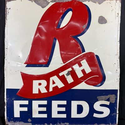 Sale Photo Thumbnail #479: Rath Feeds Red White Blue Embossed Metal Farm Sign