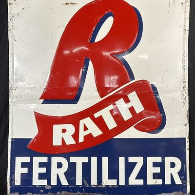 Sale Photo Thumbnail #489: Rath Feeds Red White Blue Embossed Metal Farm Sign
