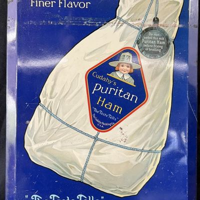 Sale Photo Thumbnail #506: Cudahy's Puritan Ham The Taste Tells Tin Over Cardboard Sign