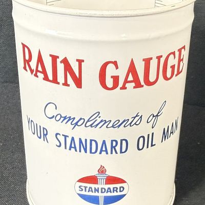 Sale Photo Thumbnail #248: Compliments Of Your Standard Oil Man Rain Gauge Metal Can