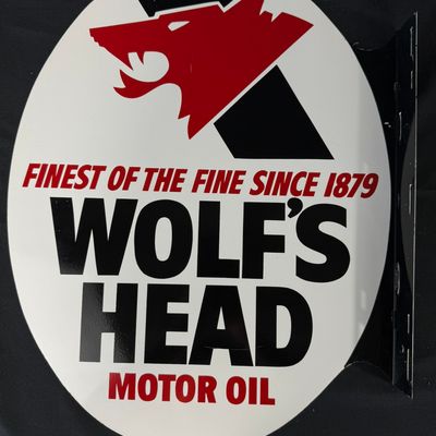 Sale Photo Thumbnail #293: 1978 Wolf's Head Motor Oil DST Painted Metal Flange Sign