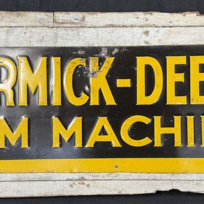 Sale Photo Thumbnail #345: McCormick Deering Farm Machines Embossed Metal Tractor Sign