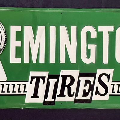 Sale Photo Thumbnail #186: Remington Tires Original Embossed Metal Horizontal Sign