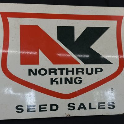 Sale Photo Thumbnail #388: Northrup King Seed Sales DST Painted Metal Flange Farm Sign