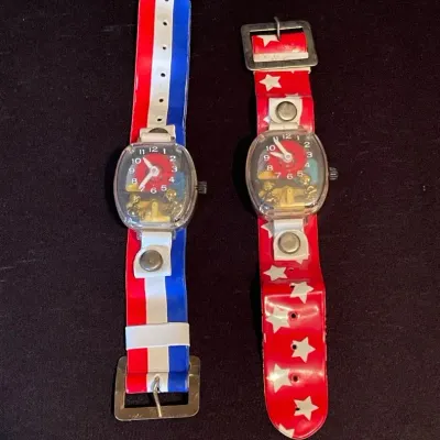 Vintage 1970s Leisure Dynamics "Teeter-Totter" Mechanical Wind-Up Toy Watches, Lot Of 2