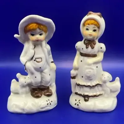 Vintage Porcelain Figurines Featuring A Boy And Girl In Victorian Style Clothing, And Puppy