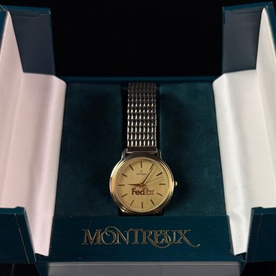 Sale Photo Thumbnail #114: Montreux FedEx 10 Year Service Award Two Tone Quartz Wristwatch with Box and Papers