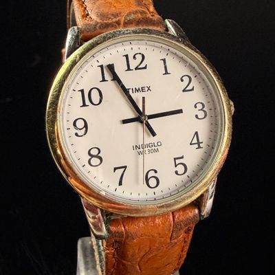 Sale Photo Thumbnail #151: Timex Indiglo Easy Reader Gold-Tone Quartz Wristwatch
