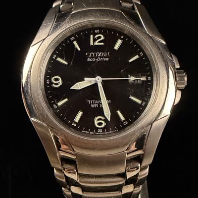 Sale Photo Thumbnail #12: Citizen Eco-Drive Titanium WR 100 Men's Watch Reference E111-K006368