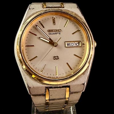 Sale Photo Thumbnail #166: Seiko Quartz SQ Day-Date Reference 5H23-8A0L Two-Tone Integrated Bracelet Watch