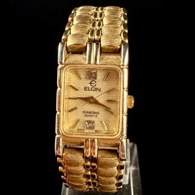Sale Photo Thumbnail #100: Elgin Diamond Quartz Ladies Tank Watch Gold Tone EM846