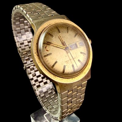 Sale Photo Thumbnail #149: Vintage Timex Marlin Day-Date Mechanical Wristwatch, 1980