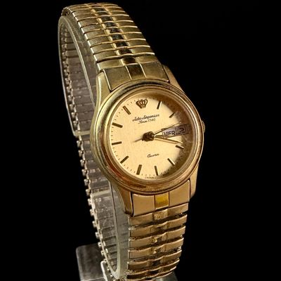 Sale Photo Thumbnail #107: Jules Jurgensen Ladies Gold Tone Quartz Day Date Wristwatch Reference 3248