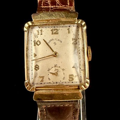 Sale Photo Thumbnail #3: Lord Elgin 14K Gold Filled Rectangular Tank Watch with Hooded Lugs and Omega Band