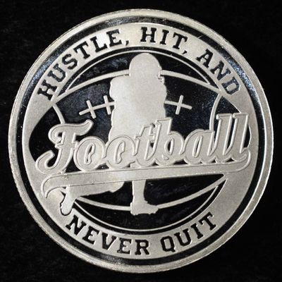 Sale Photo Thumbnail #408: FOOTBALL 1 OZ .999 SILVER ROUND