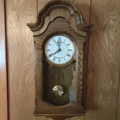 Vintage Howard Miller Oak Pendulum Wall Clock