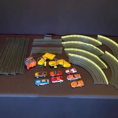 1970s Aurora AFX Model Motoring Slot Car Set, 7 Slot Cars & Extra Pieces & 1968 Kusan Grand Prix
