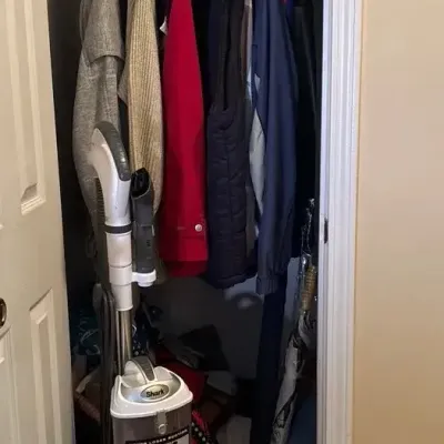 Coat Closet With Vacuums, Coats And More! 