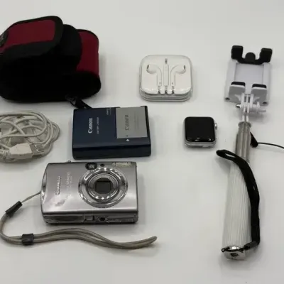 Canon Power Shot Digital Camera, Apple 2 Watch, Corded Earbuds and Selfie Stick